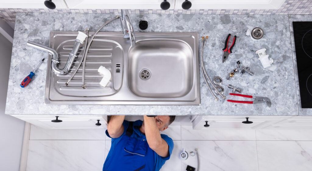 Plumb a Kitchen Sink With Disposal and Dishwasher 4